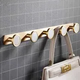 Barre porte manteau dorée, vue 2